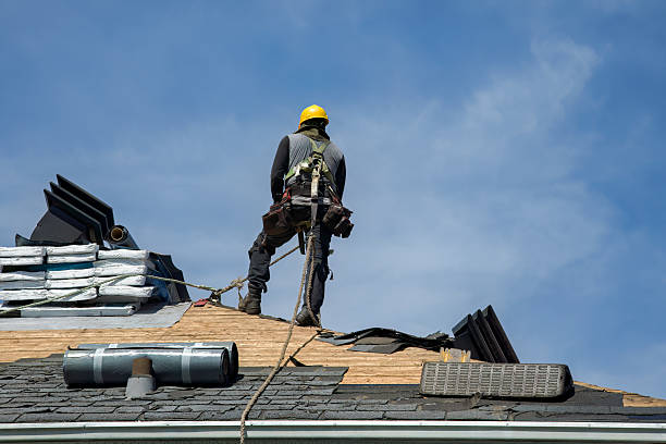 Professional Metal Roofing technician working in Houghton, MI
